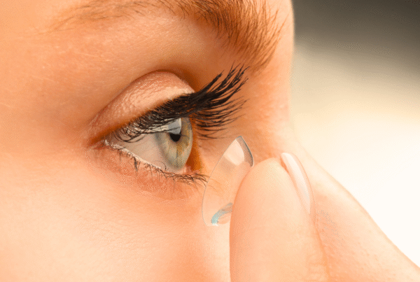 Lady putting ortho k contact lens in